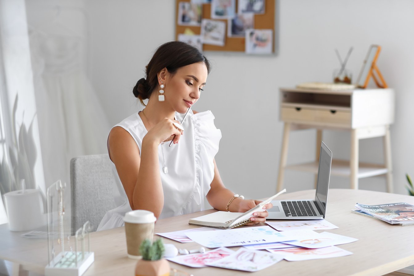 Female Wedding Planner Working in Office